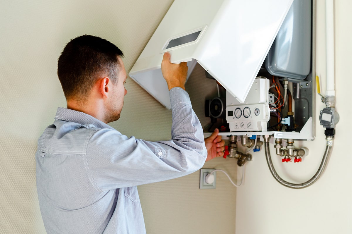 Engineer installing a boiler