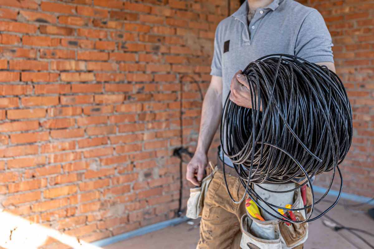 An electrician rewiring a commercial property